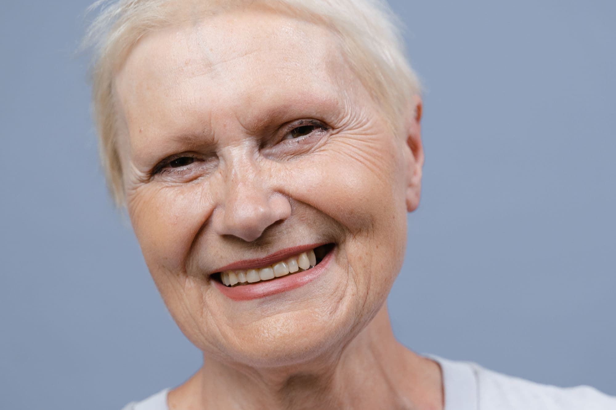 Older woman smiling, close portrait